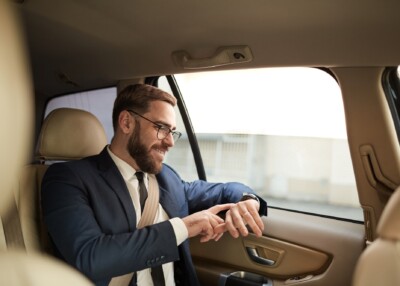 Businessman travelling by taxi